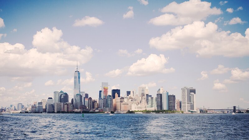 Manhattan Skyline — Blue, Serene, Afternoon, Photograph, Skyscrapers, Water, Clouds