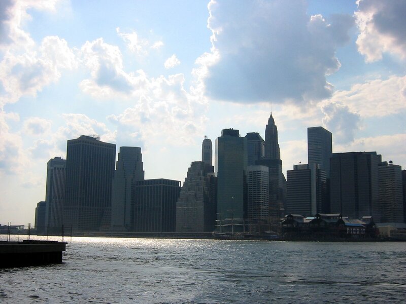 Manhattan Skyline — Blue, Serene, Afternoon, Photograph, Skyscrapers, Water, Clouds, White