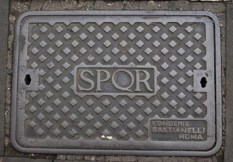 manhole cover with spqr inscription