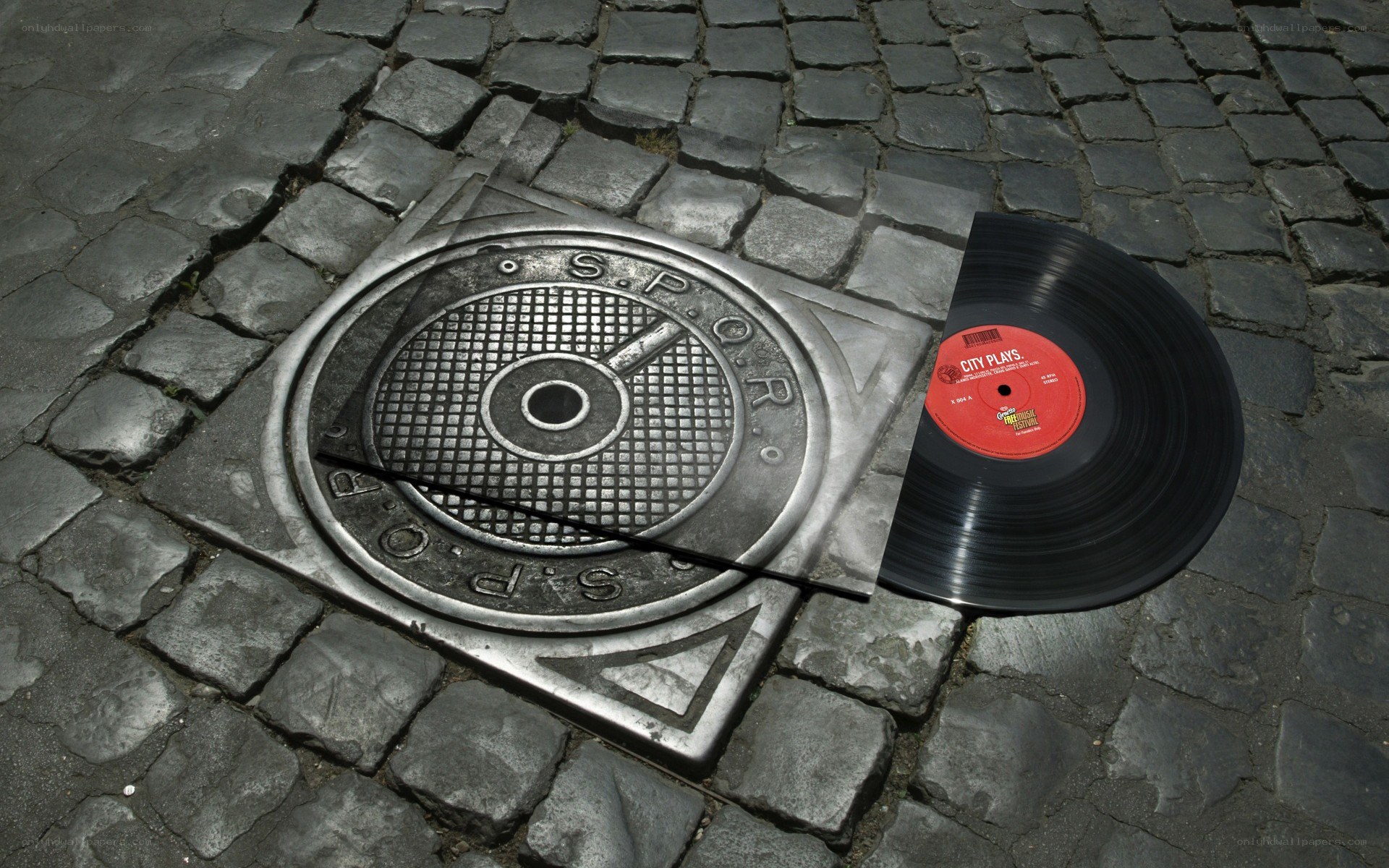 Manhole cover with vinyl record