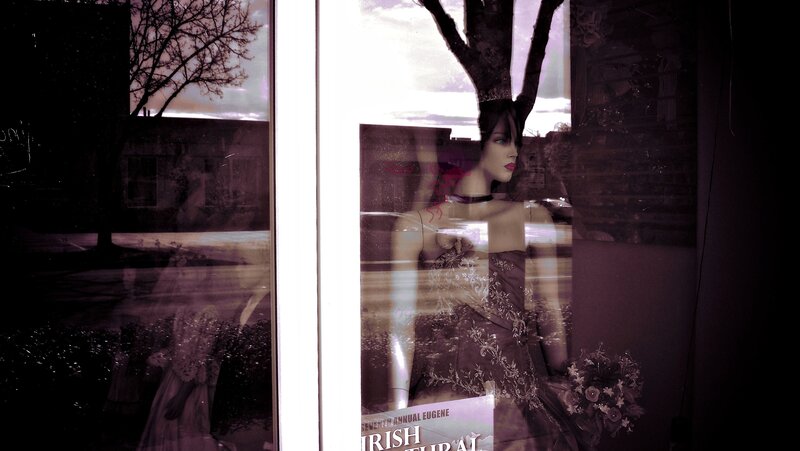 Mannequin in store window