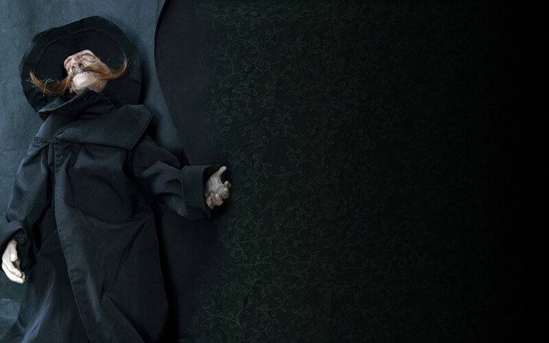 Mannequin with mustache lying down