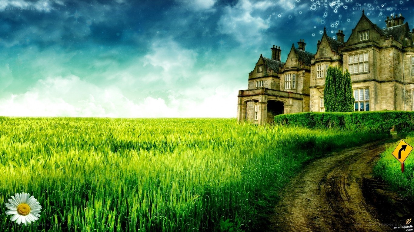 Manor house in green field