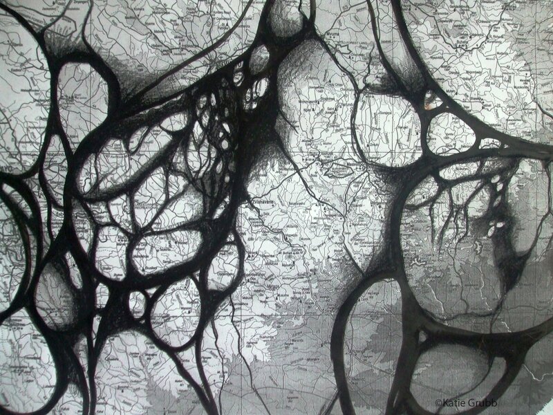 Map with abstract black overlay