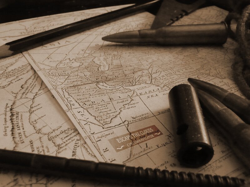 map with bullets and compass