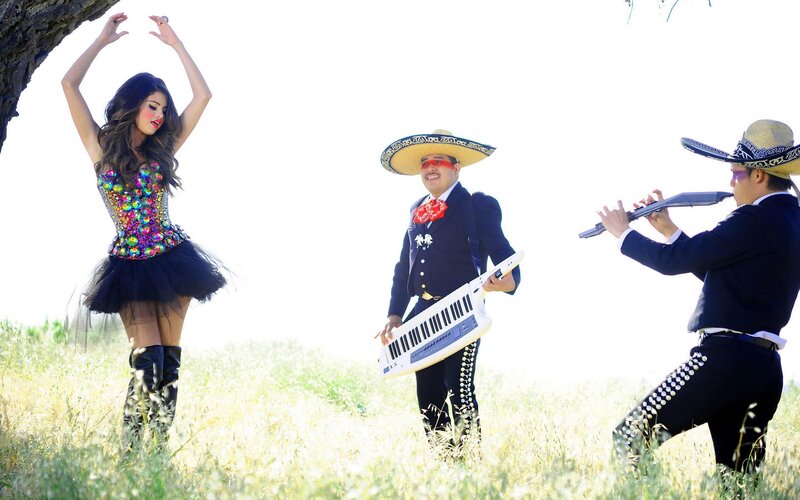 Mariachi band with dancer