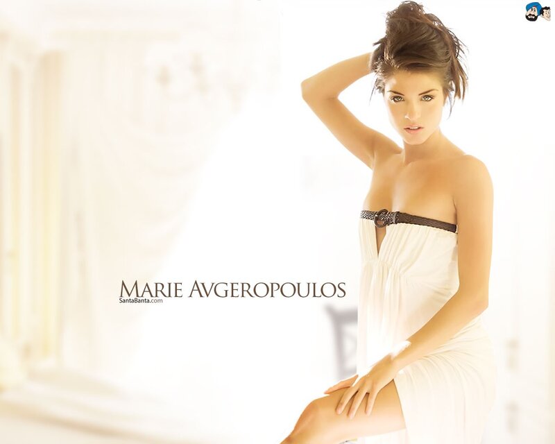 Marie Avgeropoulos in white dress