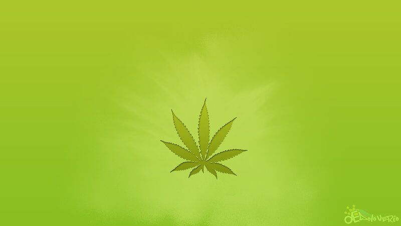 marijuana leaf on green
