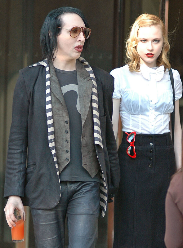 Marilyn Manson and a woman walking