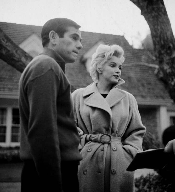 Marilyn Monroe and a man outdoors