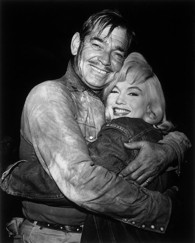 Marilyn Monroe and Clark Gable embrace