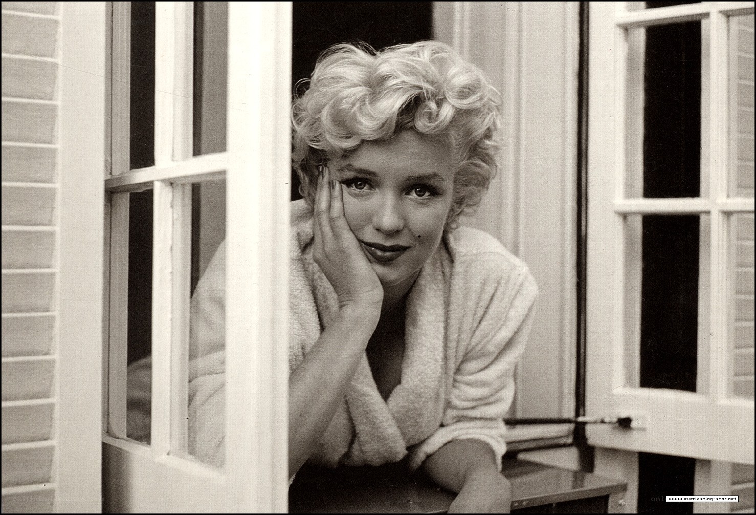Marilyn Monroe at window