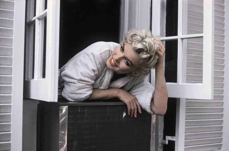 Marilyn Monroe at window