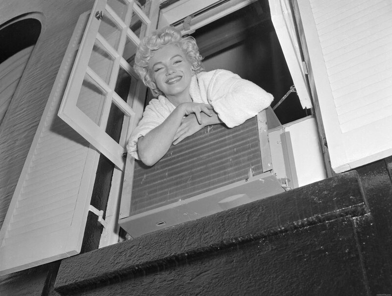 Marilyn Monroe at window