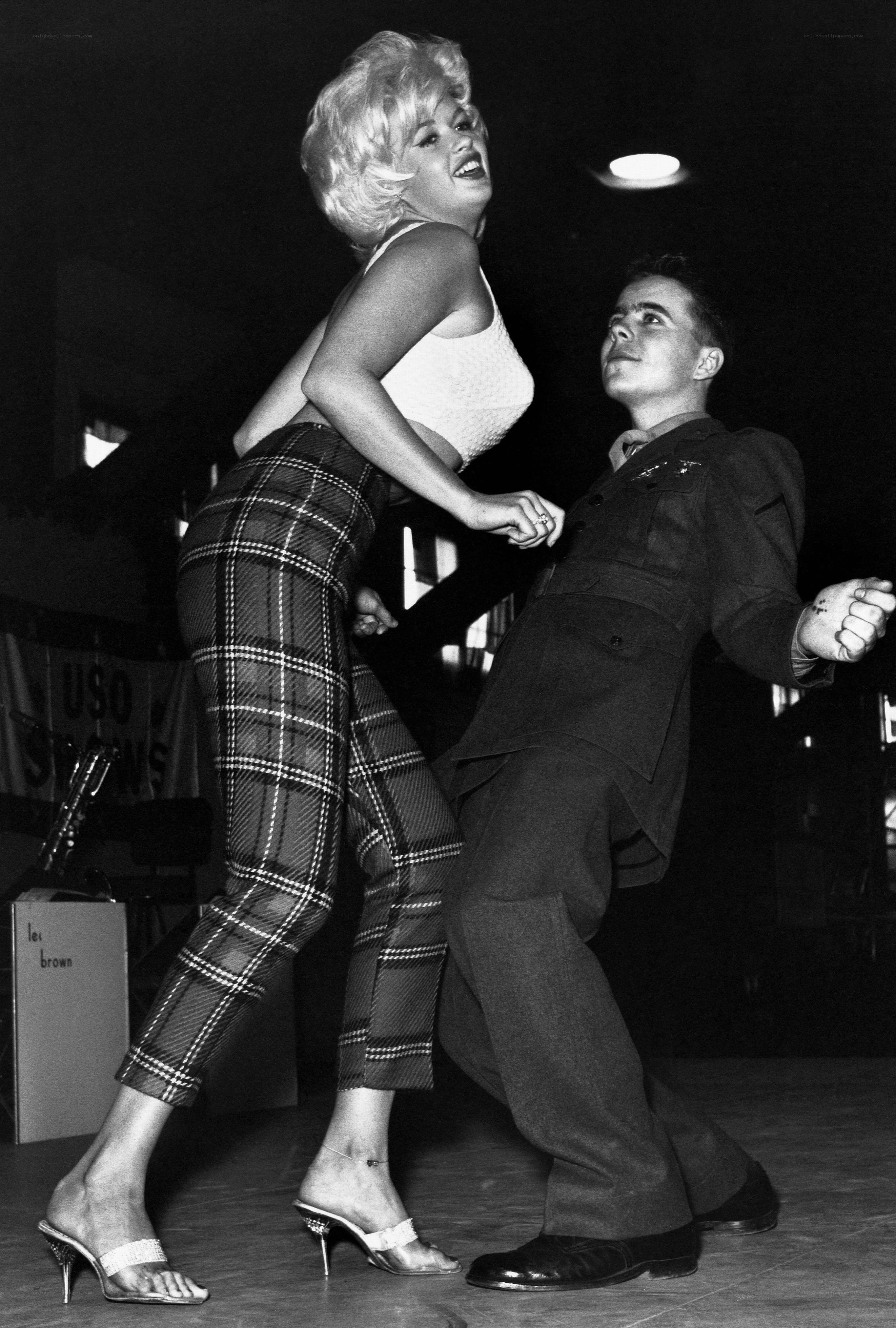 Marilyn Monroe dancing with soldier