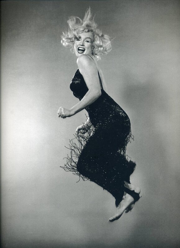 Marilyn Monroe jumping in a dress