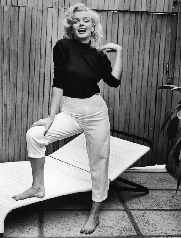 Marilyn Monroe laughing outdoors