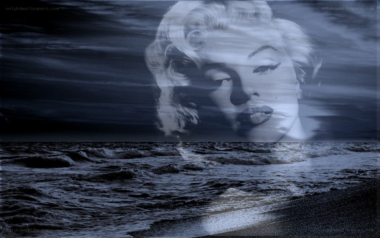 Marilyn Monroe on a stormy beach