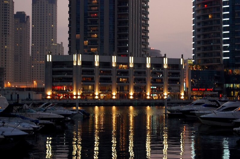 marina at dusk with city skyline