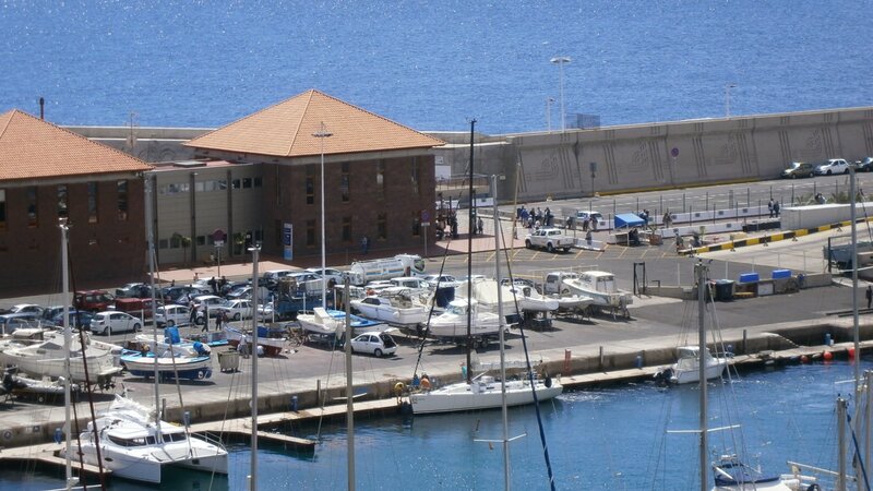 Marina with Boats and Buildings — Blue, Calm, Afternoon, Photograph, Cars