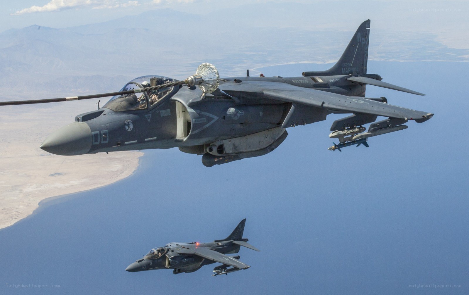 Marine Corps Harrier jets in flight