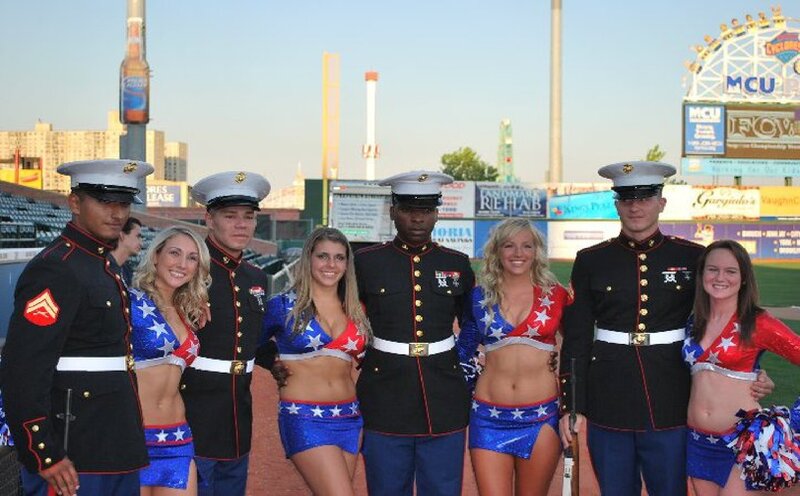 Marine Corps Members with Cheerleaders