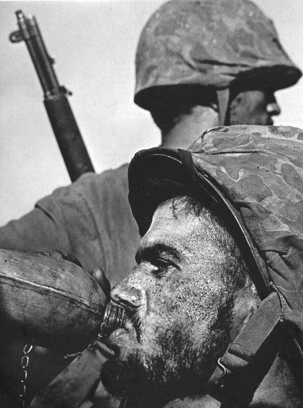 Marine drinking from canteen