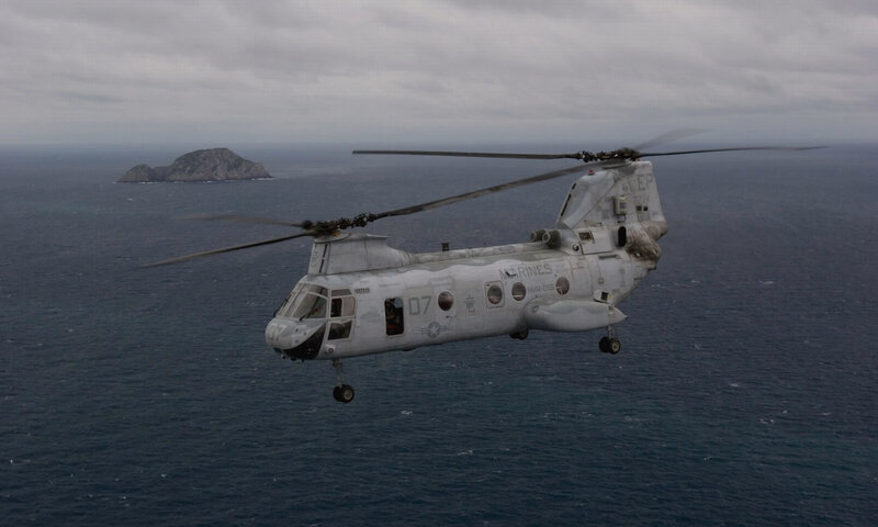 Marine helicopter over ocean
