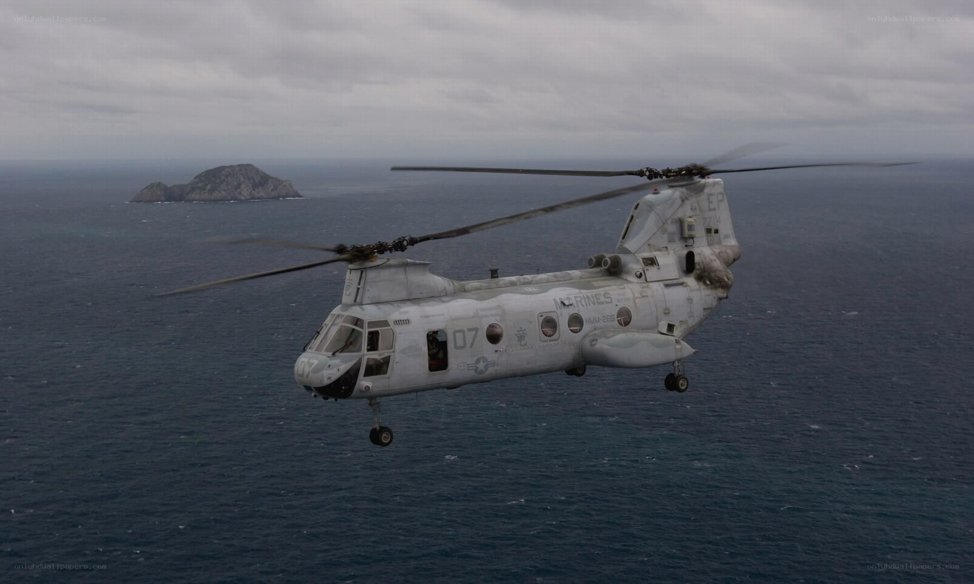 Marine helicopter over ocean