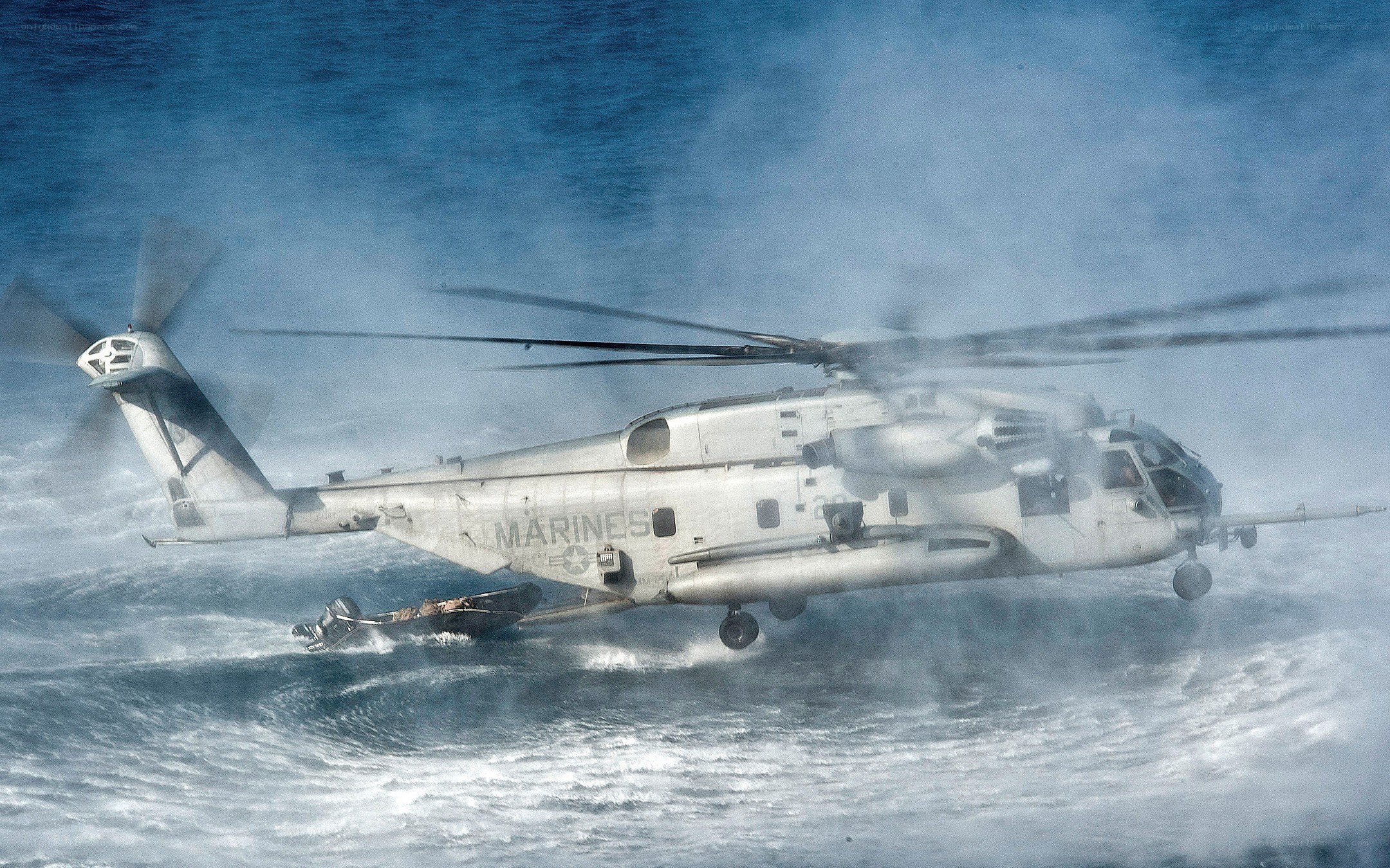 Marine helicopter over ocean