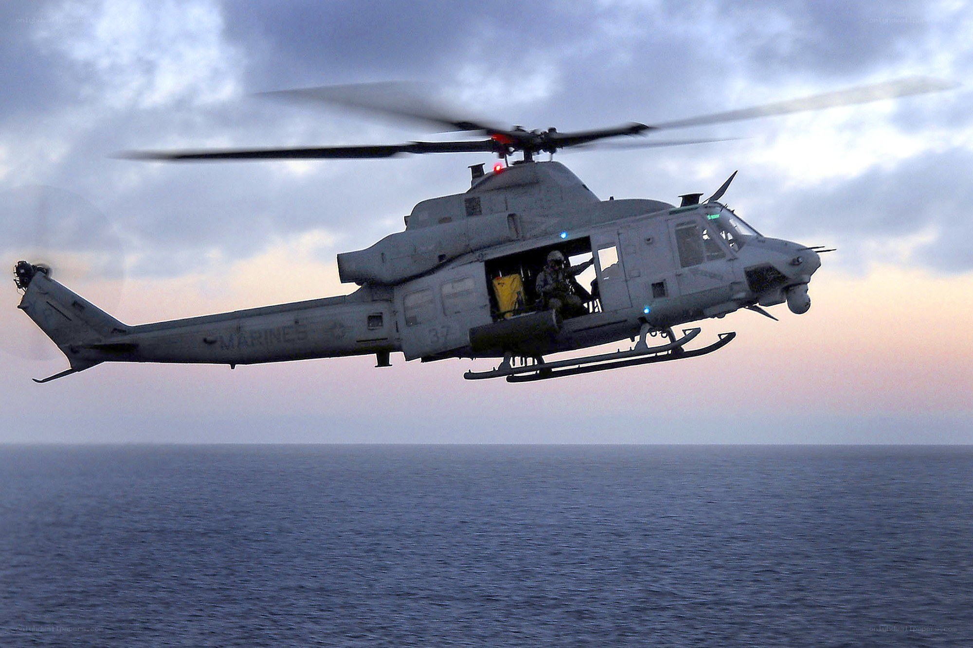 Marine helicopter over ocean