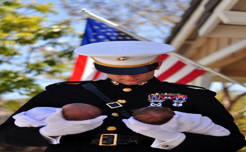 Marine Holding Babies