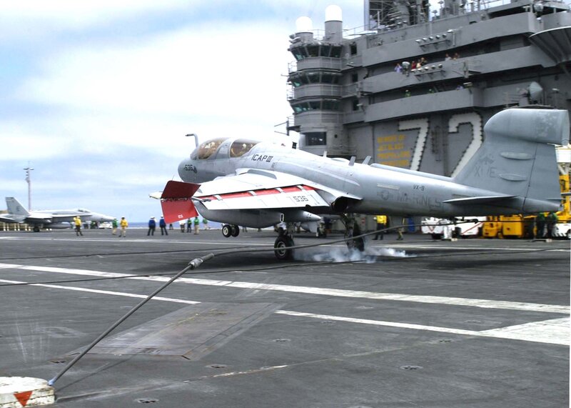 Marine jet on aircraft carrier deck