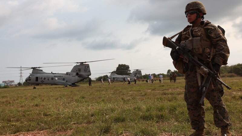 Marine soldier with helicopters