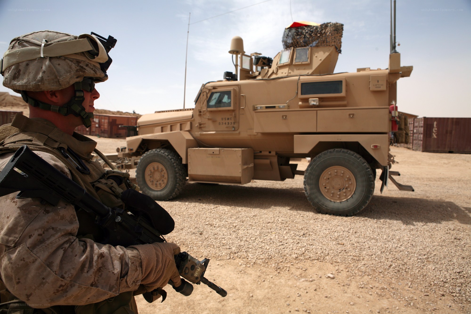 Marine with armored vehicle