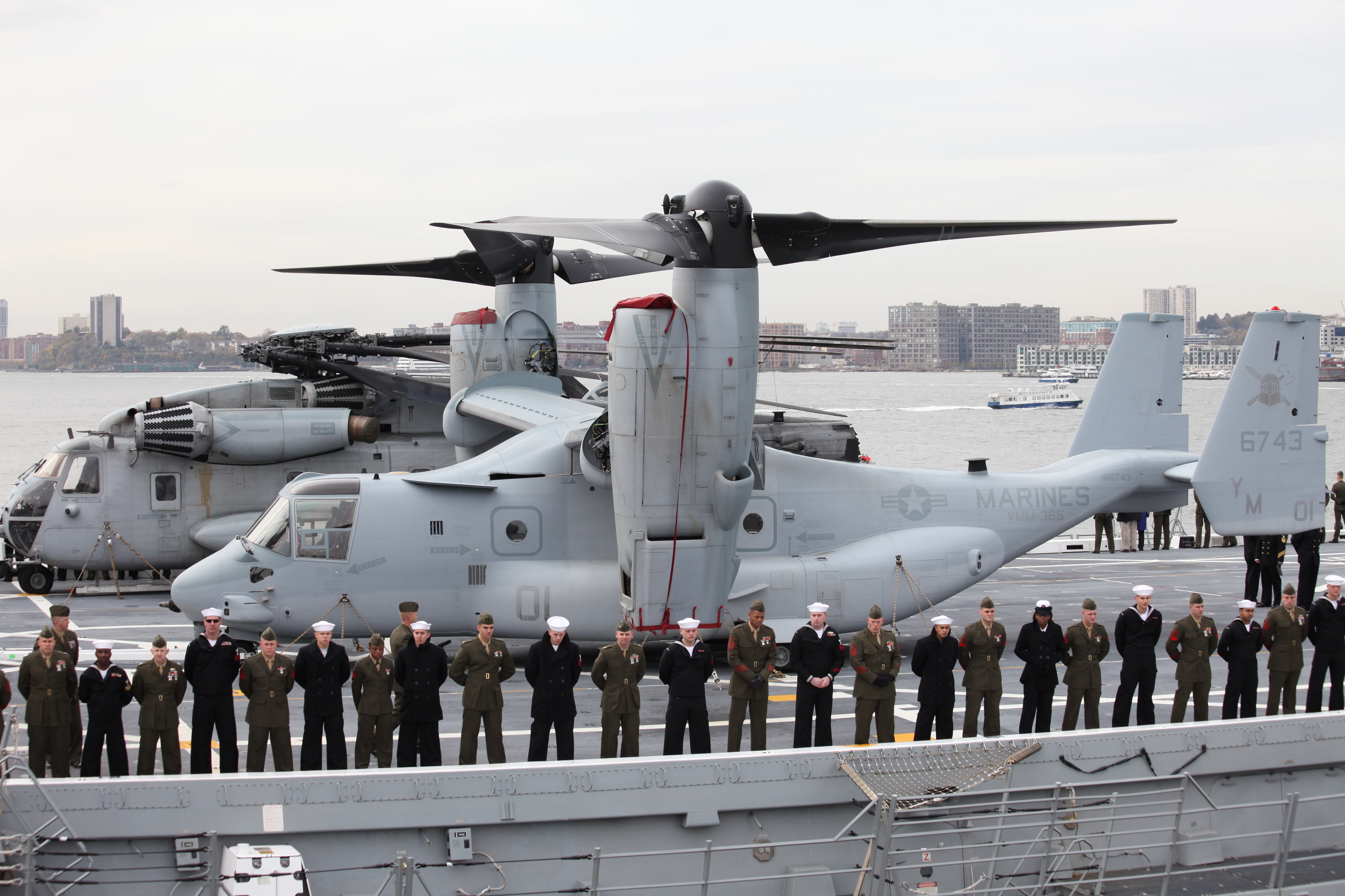 Marines and helicopters on ship deck