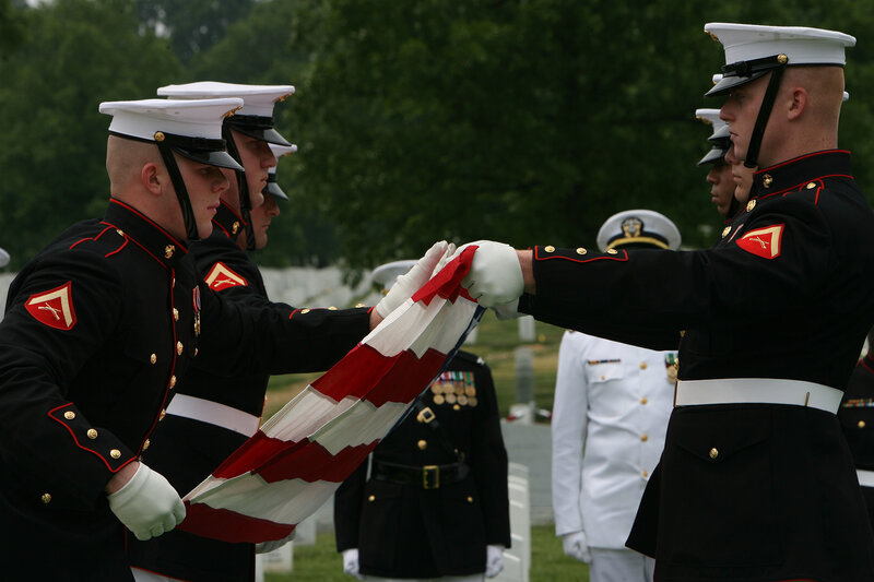 Marines folding the flag