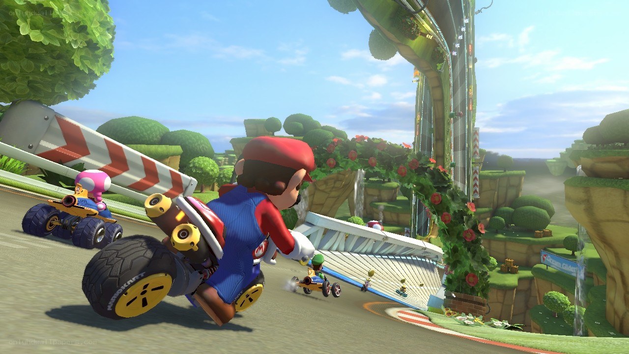 Mario Kart racing on a track