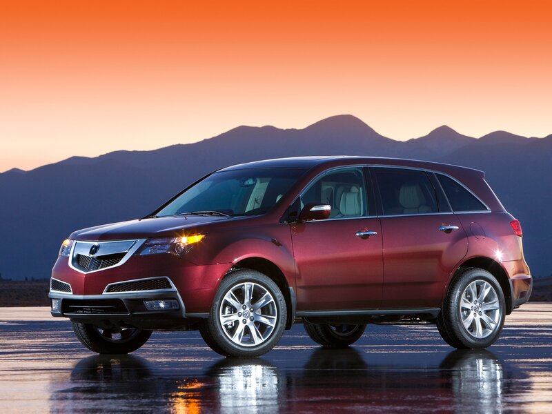 Maroon Acura MDX at sunset