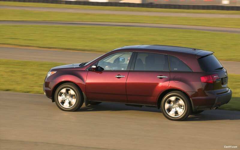 maroon acura mdx on track