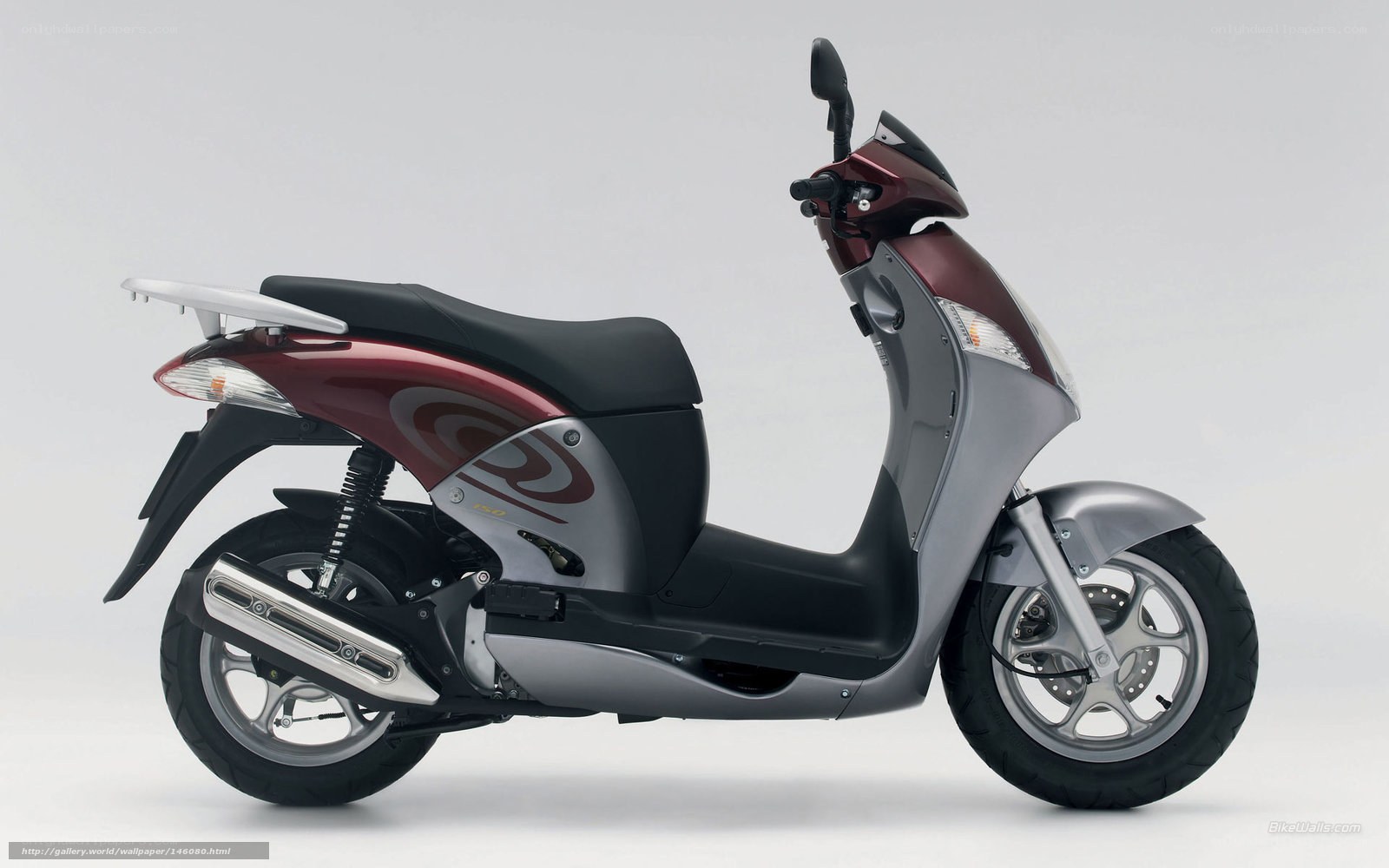 Maroon and silver scooter