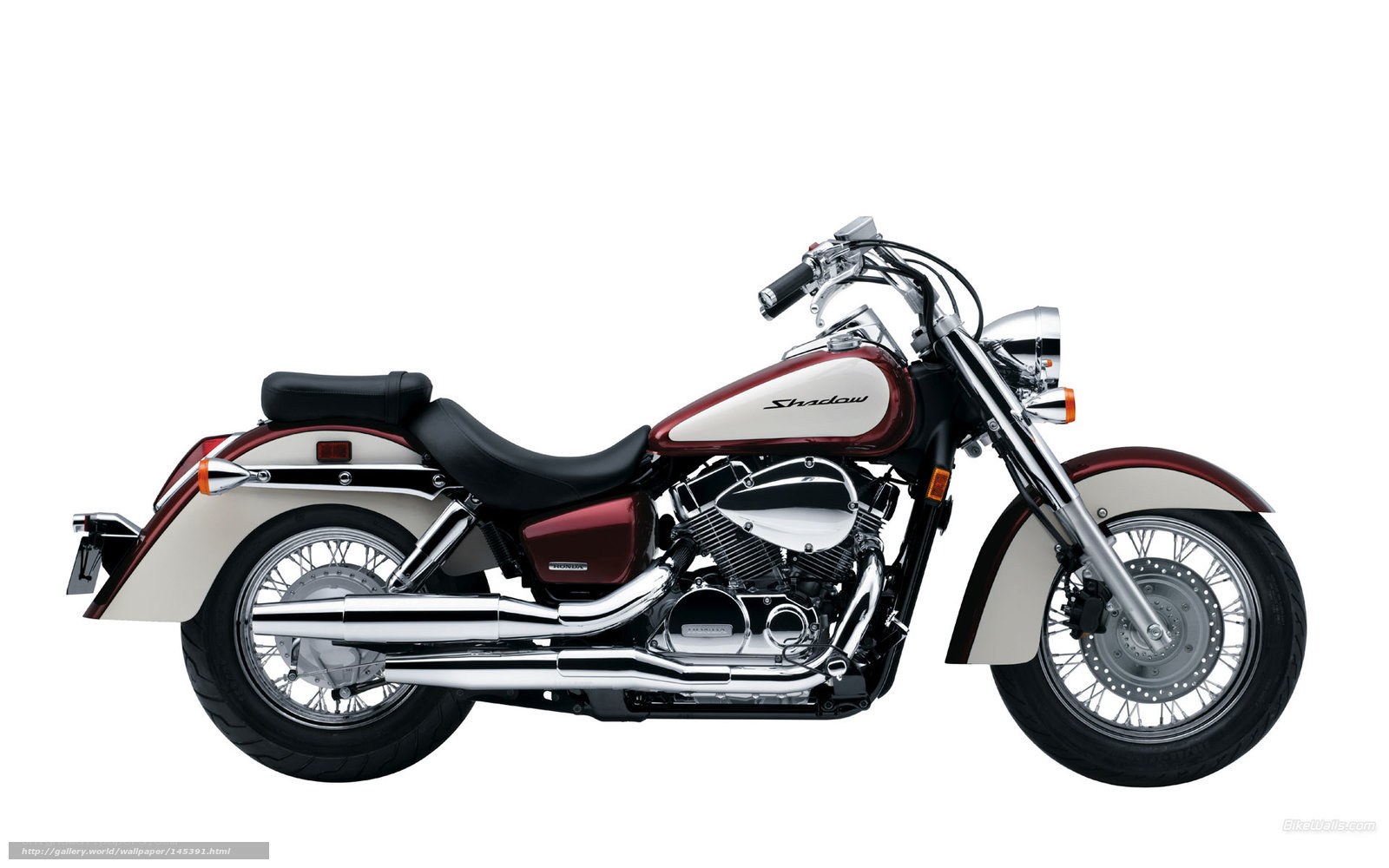 Maroon and white cruiser motorcycle