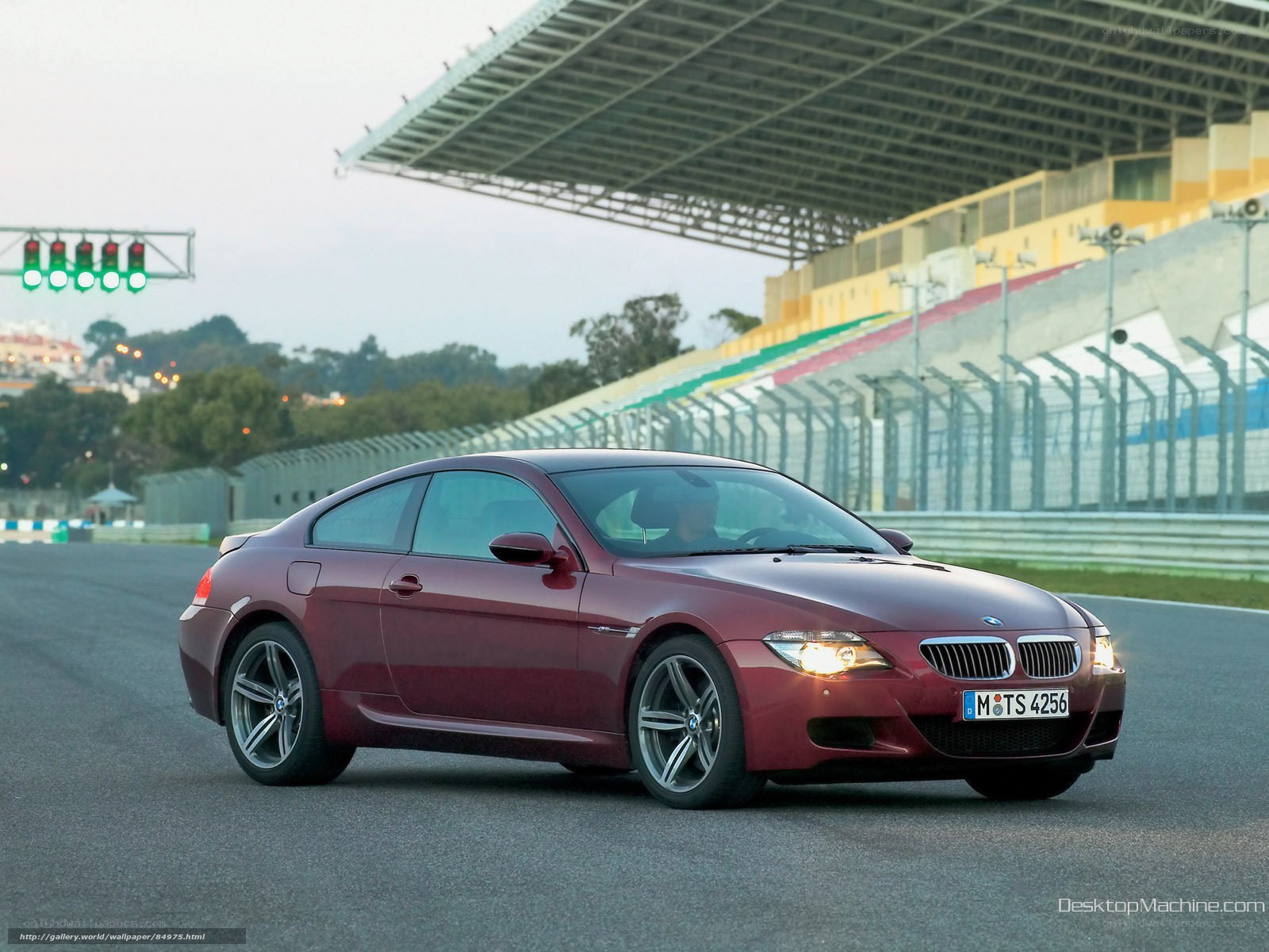 Maroon BMW M6 on racetrack