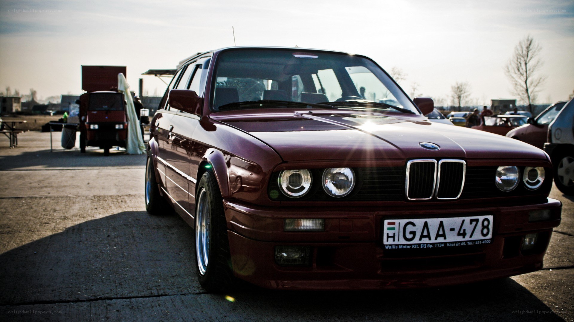 maroon bmw station wagon
