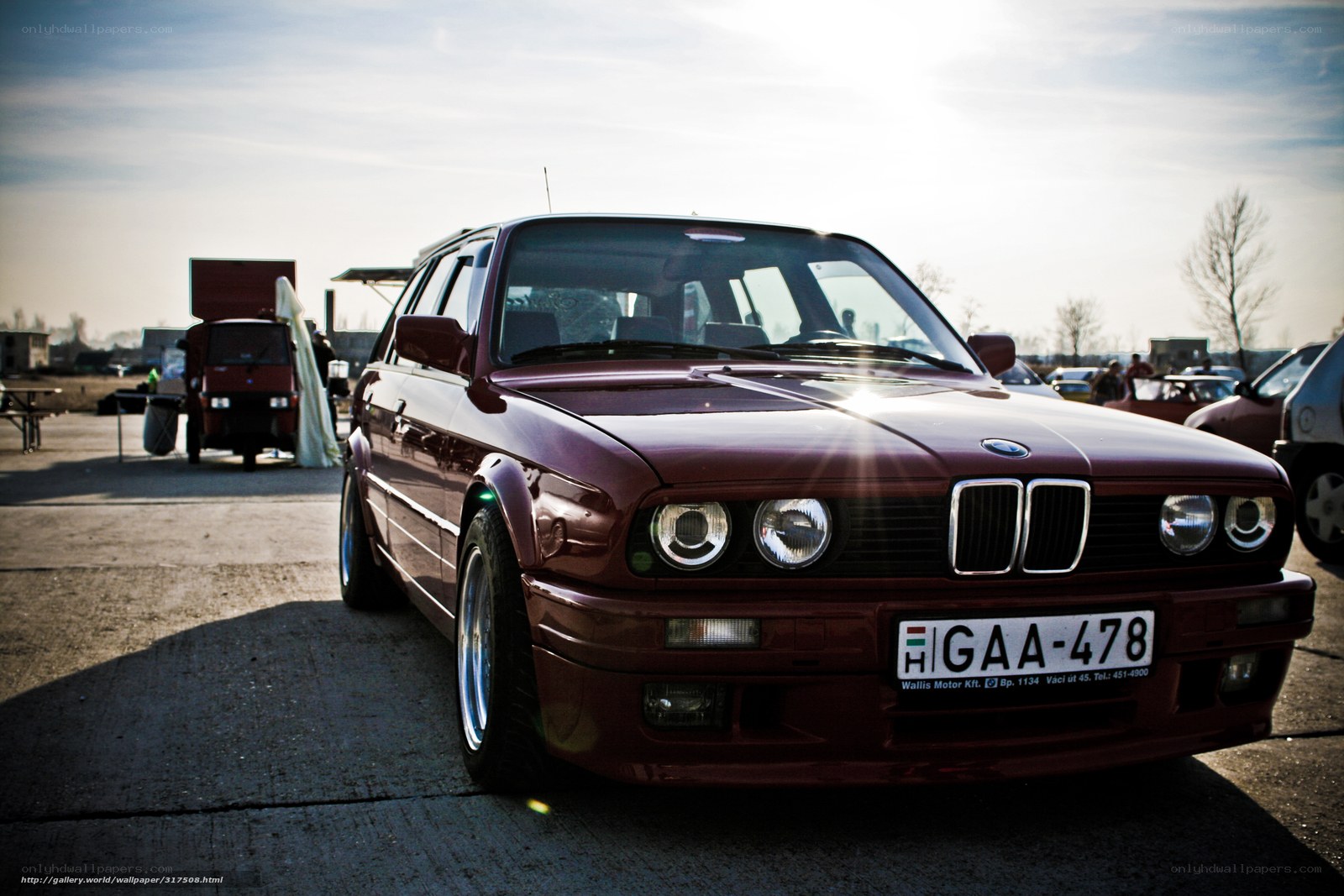 maroon bmw station wagon