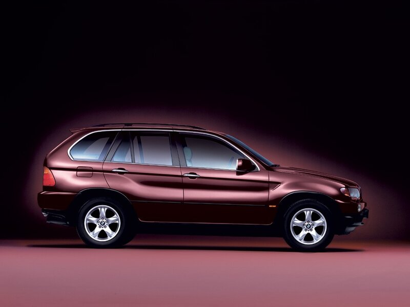 maroon bmw suv side view