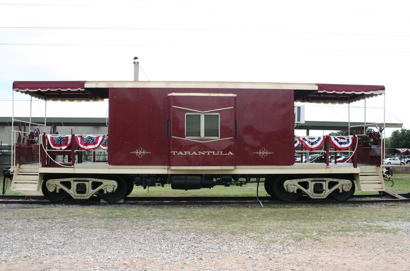 Maroon caboose named Tarantula