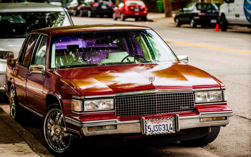 Maroon Cadillac Sedan