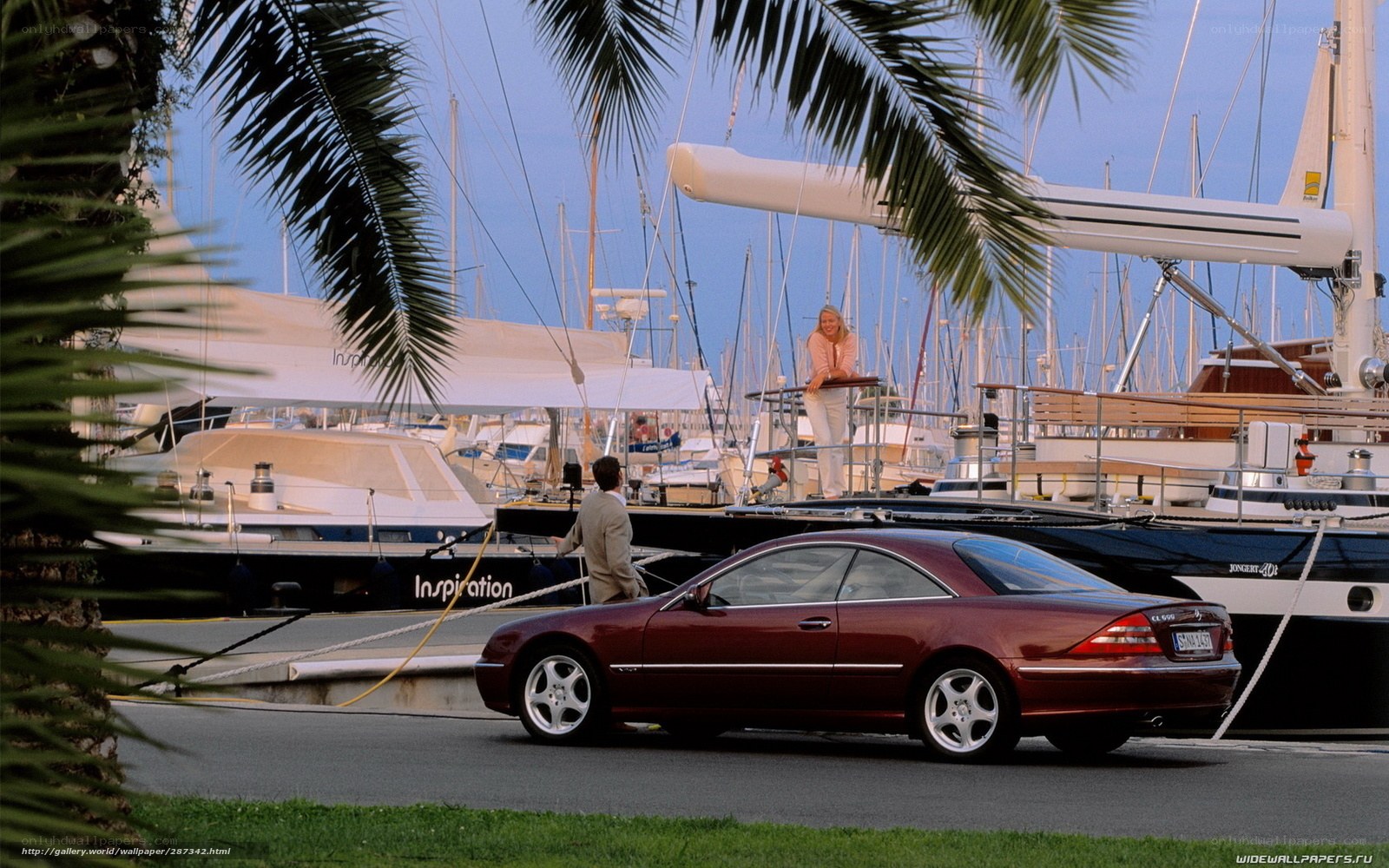 Maroon car at marina
