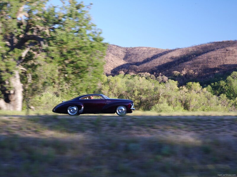 Maroon Car on Road — Serene